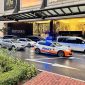 Luxury shuttle vehicles with police escort driving in a city street in sandton Johannesburg