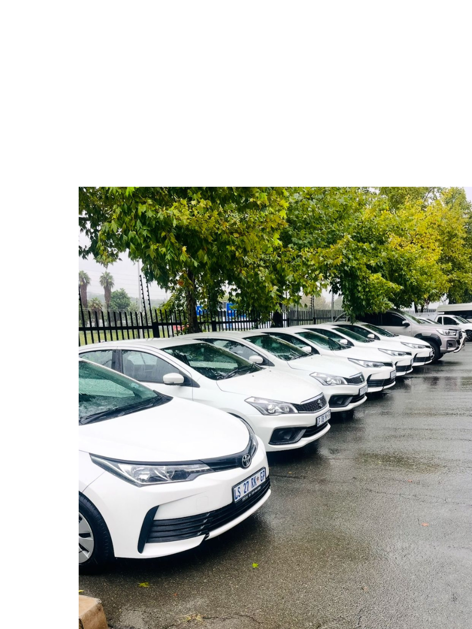 Elegant 3 seater shuttle sedan parked and ready for private transfer service
